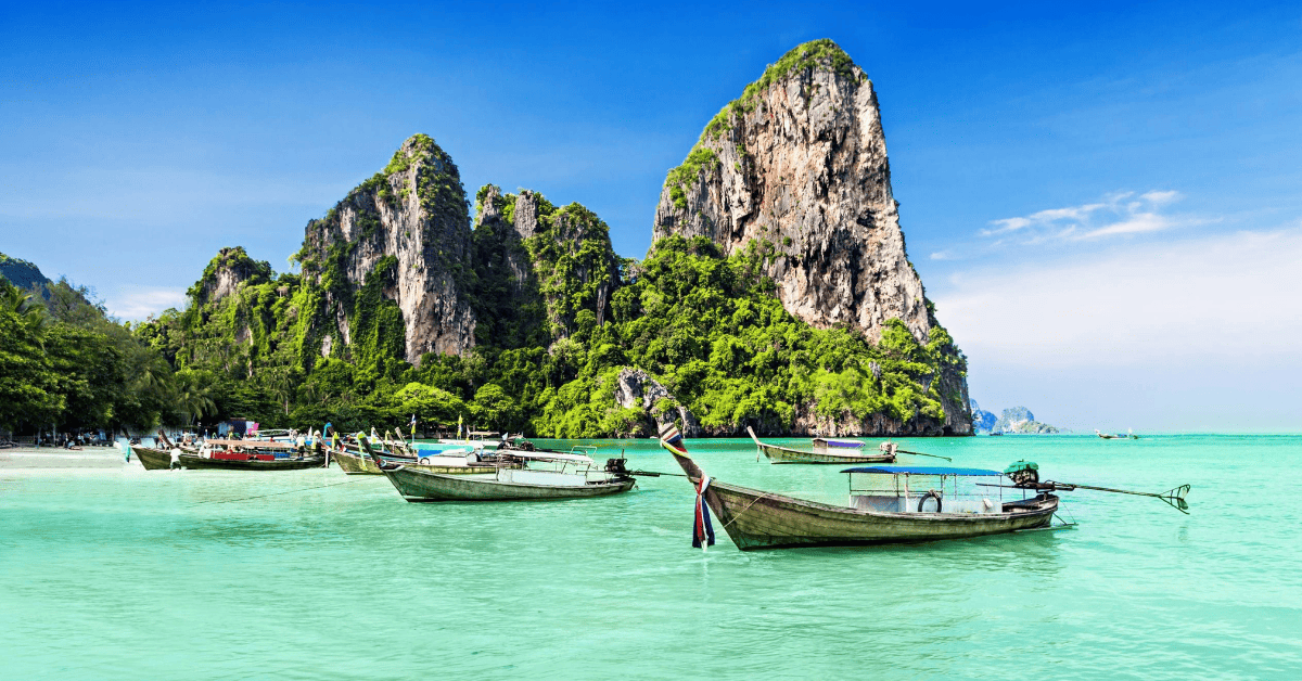 Boats in the water near hotels in Phuket.