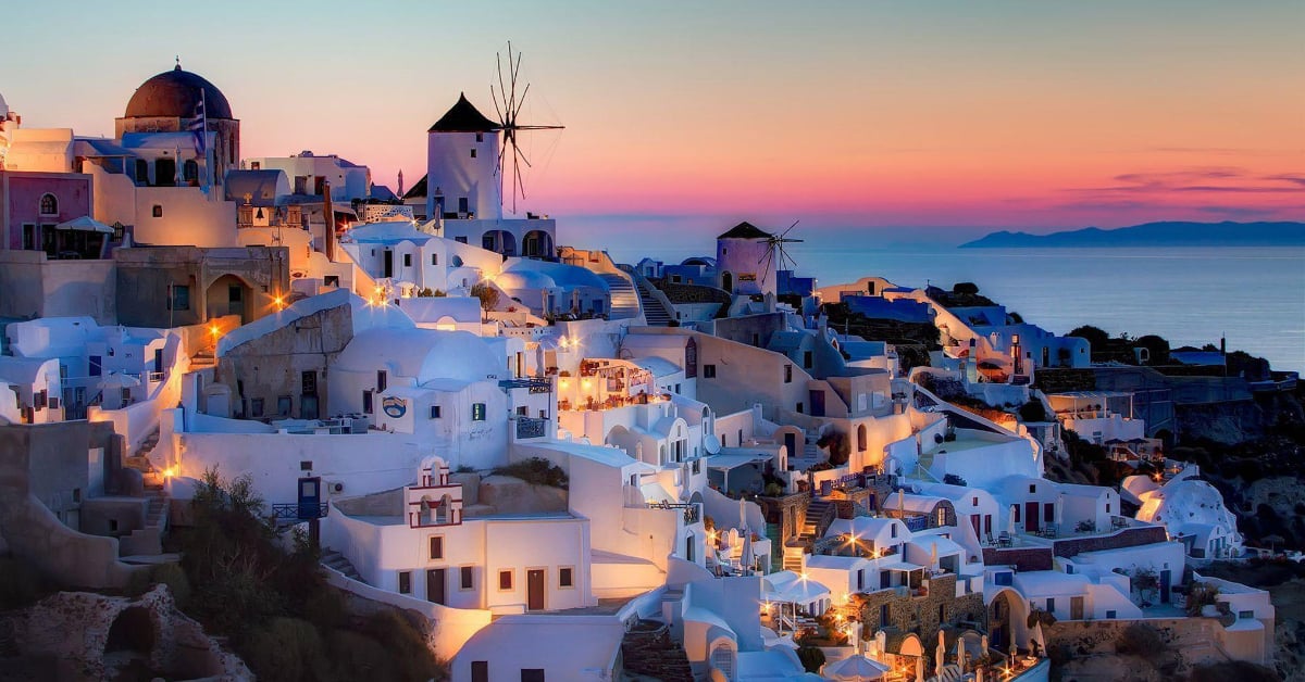 Santorini, greece at sunset offers breathtaking views and is a popular destination for tourists seeking Greece hotels with stunning scenery.